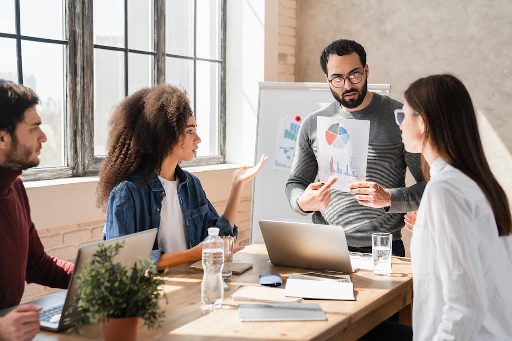 Group of people discussing marketing strategy